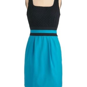 Black and blue sheath dress